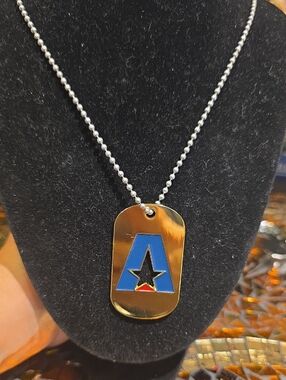 Gold Tone Dog Tag Necklace with Blue Star Accent